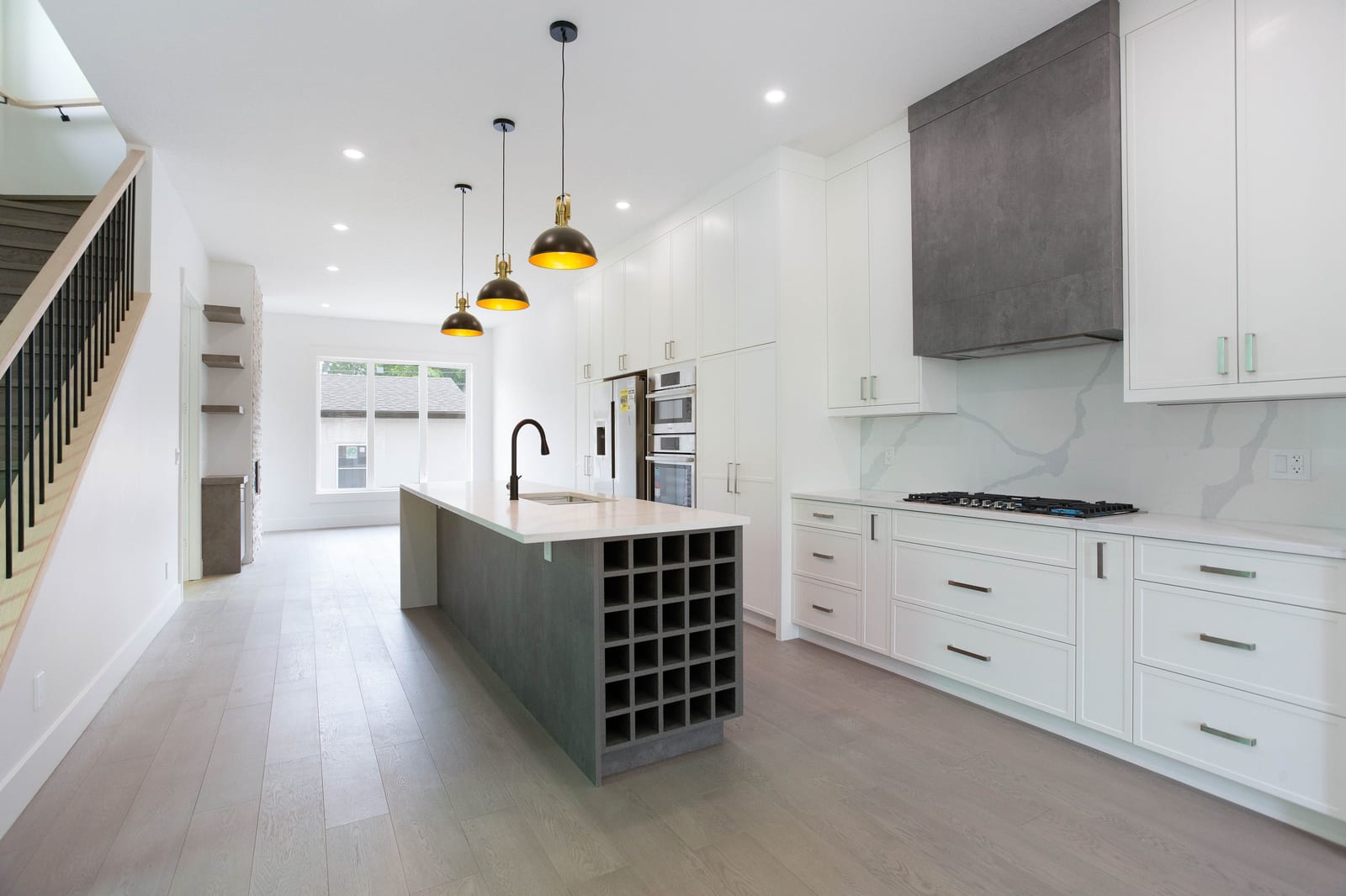 Kitchen island and full-height cabinetry — supplied paired-home gallery; confirm 1106 finishes