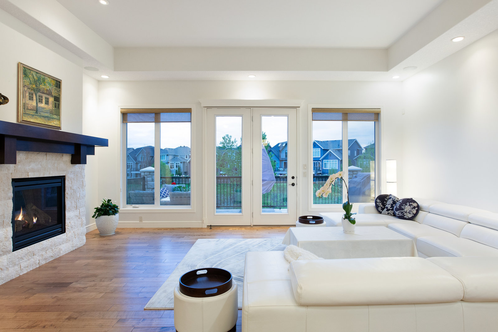 Main living room with tall windows