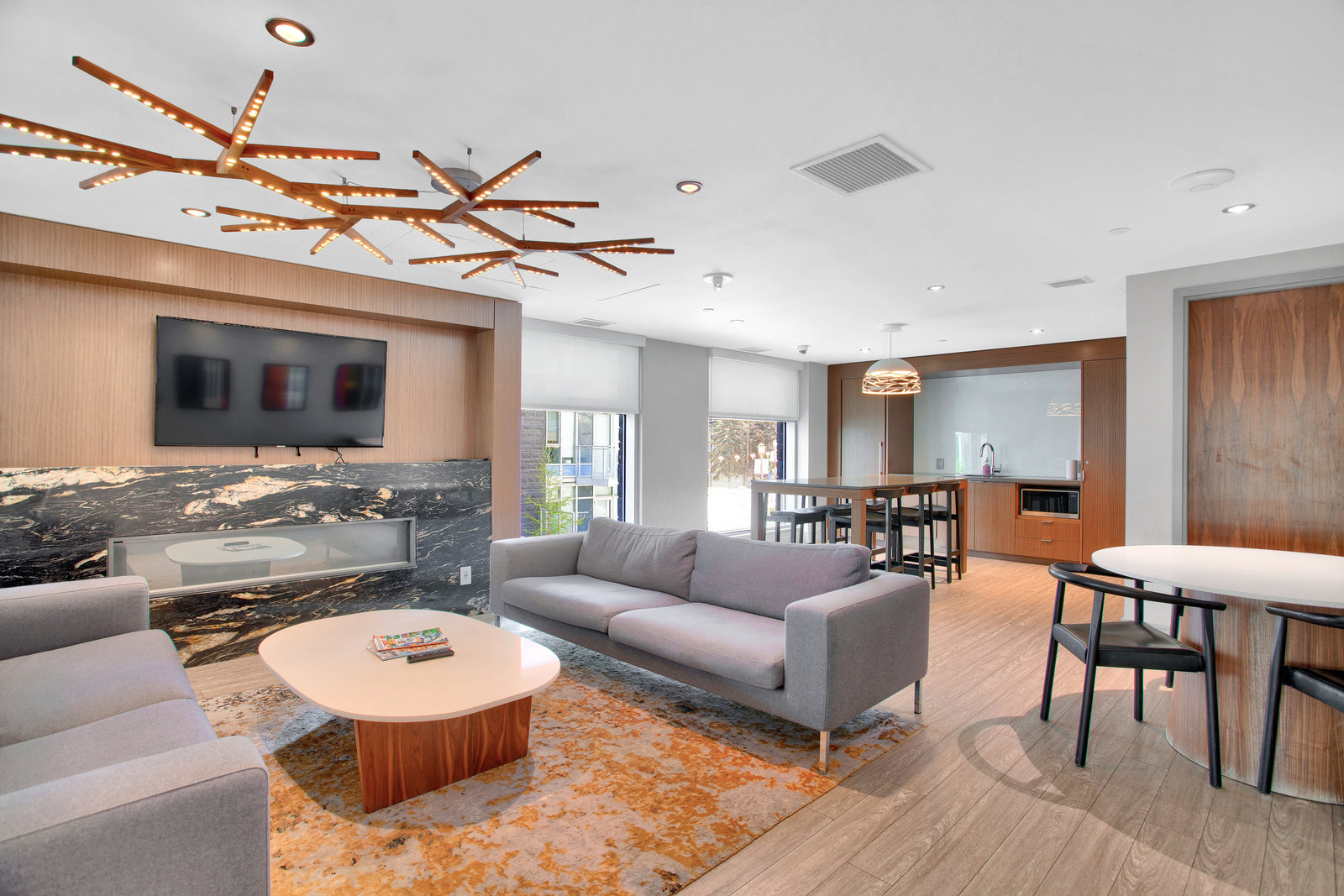 Shared lounge with fireplace and seating