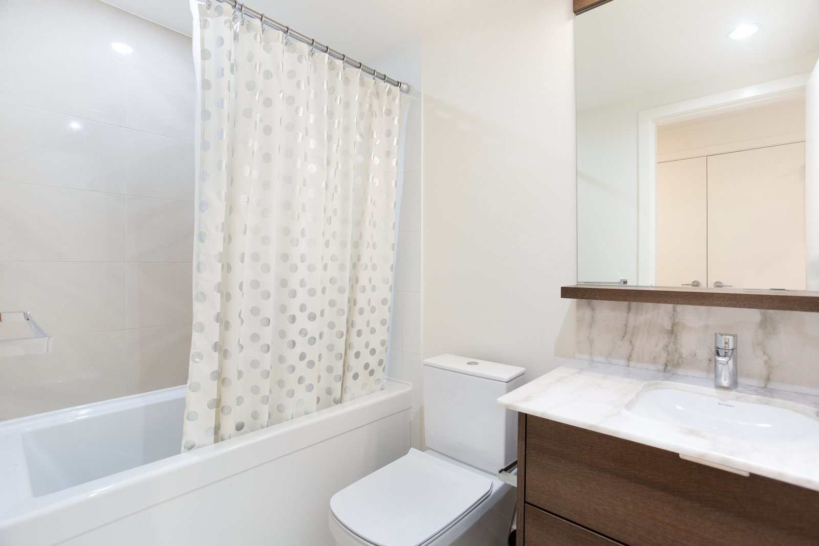 Bathroom vanity and tub