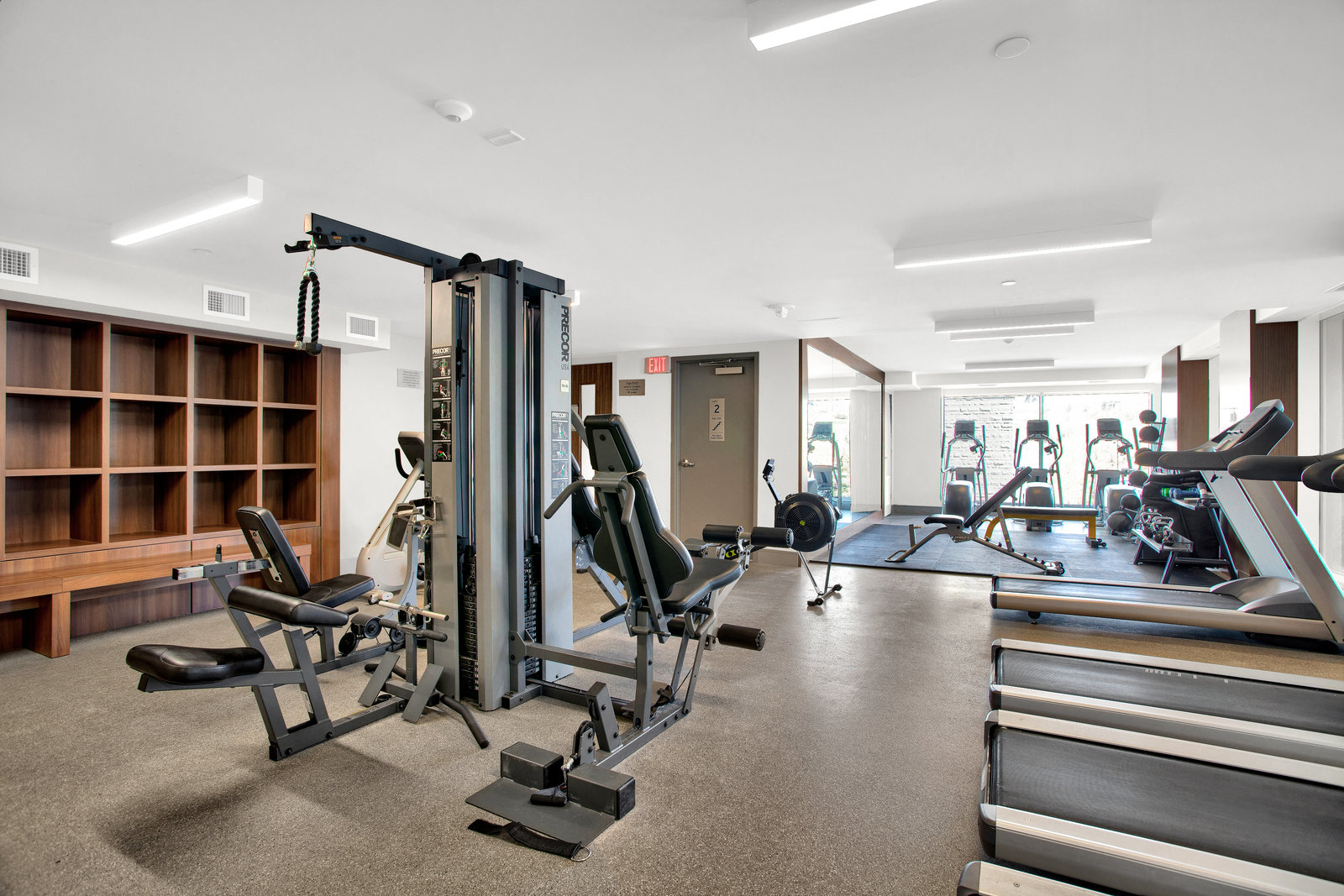 Shared fitness room with exercise equipment