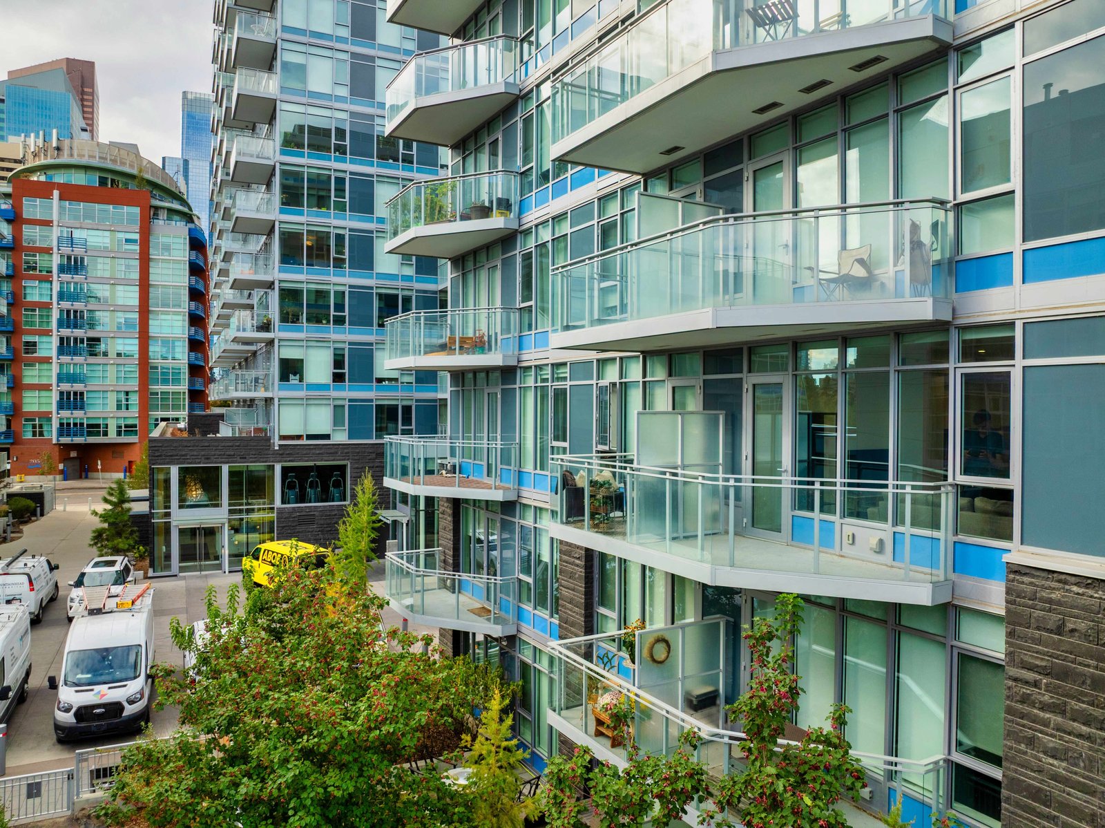 Waterfront building exterior and landscaped courtyard