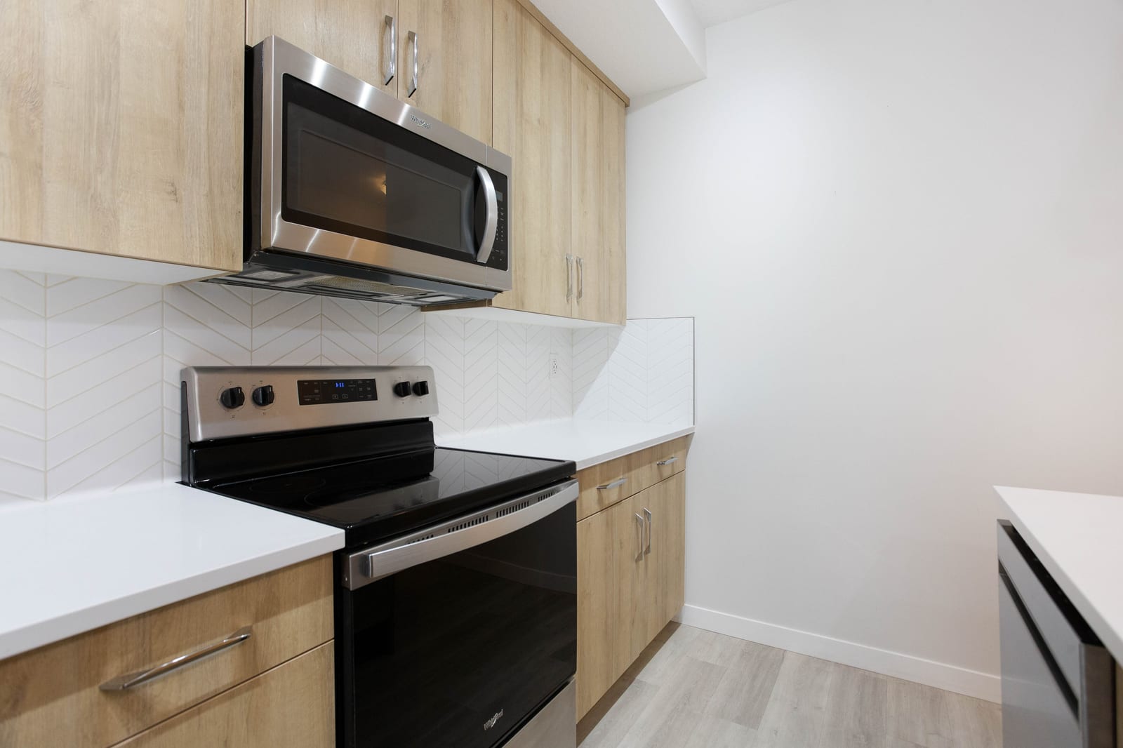 Range and tiled backsplash