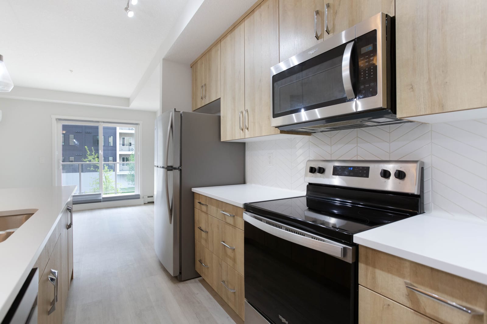 Kitchen appliances and open living area